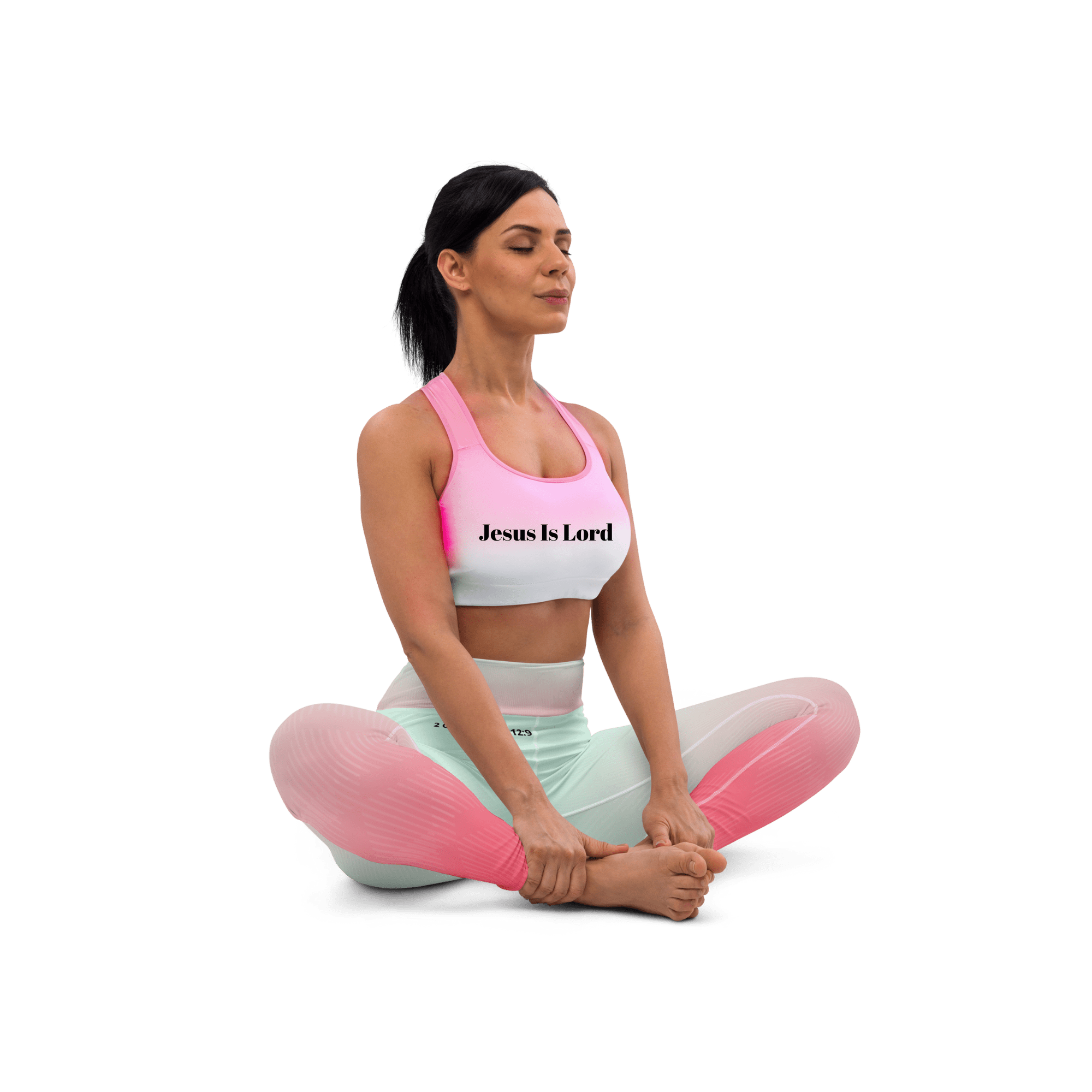 Brunette-woman-wearing-a-matching-pink-and-green-neon-gradient-leggings-and-bra-set-that-says-Jesus-Is-Lord