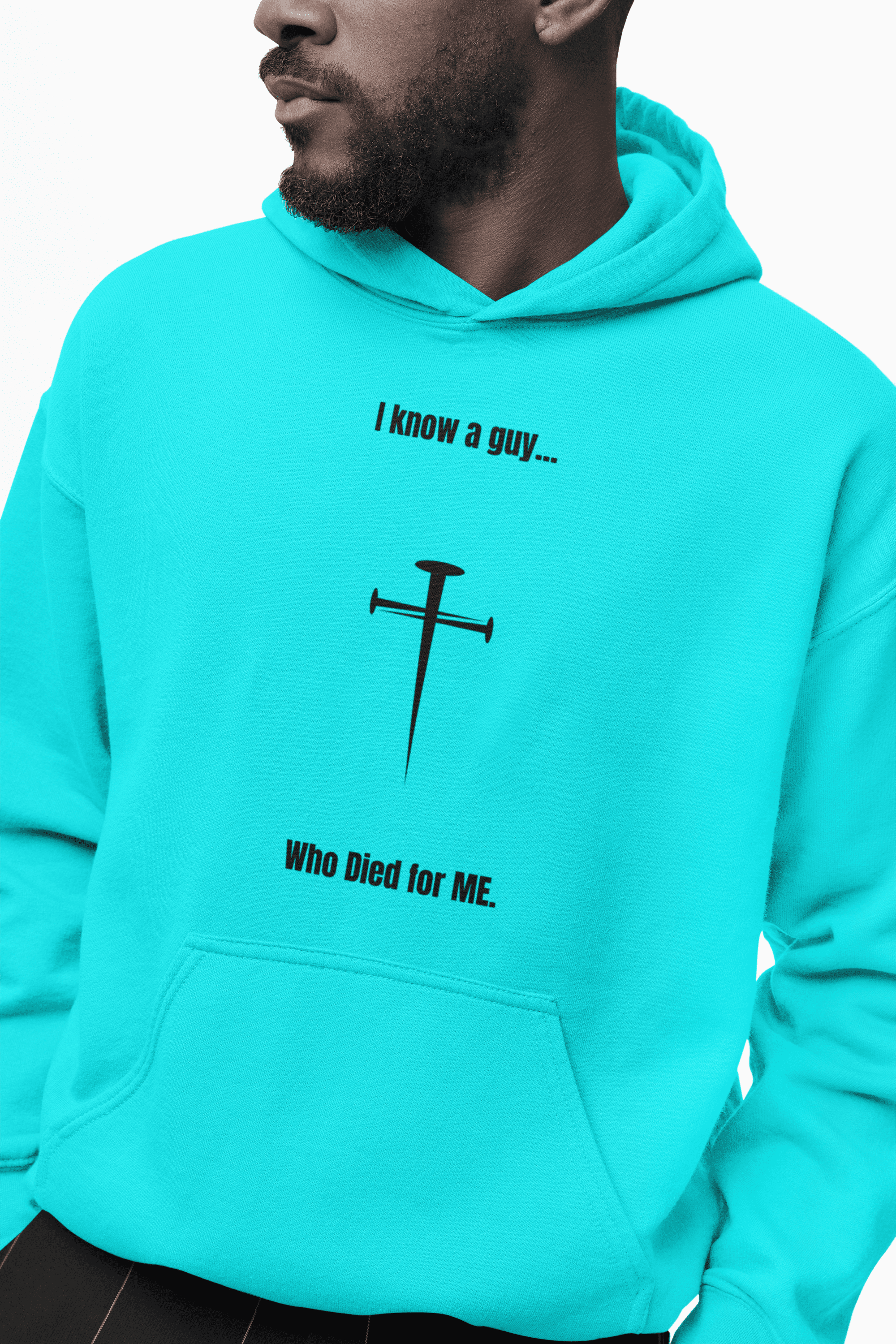 bearded-man-wearing-a-teal-gildan-pullover-hoodie-that-states-I-Know-A-Guy-Who-Died-For-Me