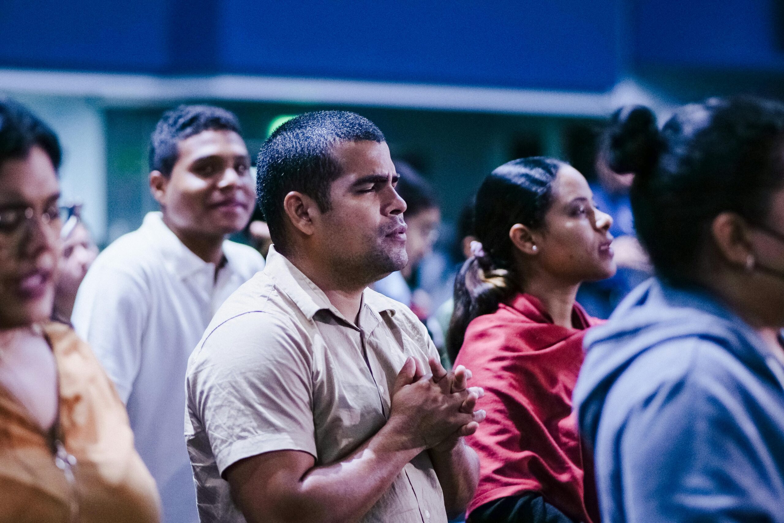 A-group-of-Christians-standing-and-worshipping-Jesus-in-a-church-service